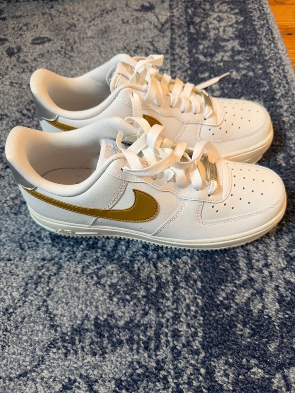 Brand New Nike Air Force One White Sneakers with Gold Swoosh Accent